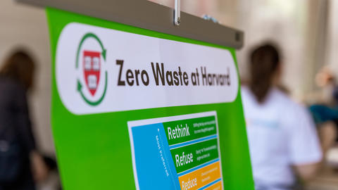 A portion of a sign that reads "Zero Waste at Harvard". 