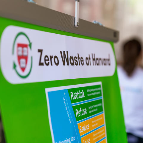 A portion of a sign that reads "Zero Waste at Harvard". 